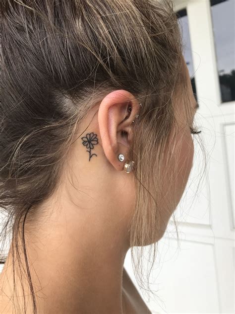 flower tattoo ear